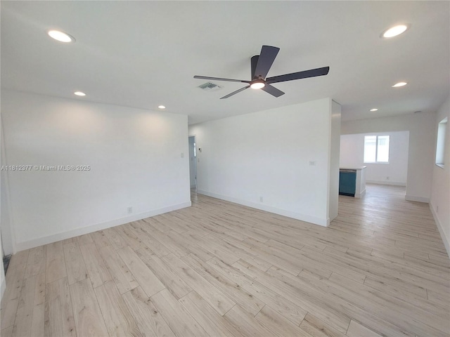 4579 NW 16th Way, Tamarac, FL 33309 - spare room with a ceiling fan, light wood-style floors, recessed lighting, and baseboards