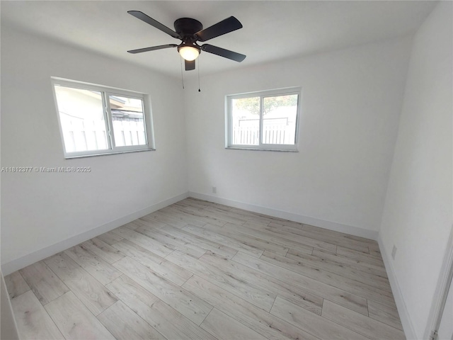 4579 NW 16th Way, Tamarac, FL 33309 - spare room featuring wood finished floors, a ceiling fan, and baseboards
