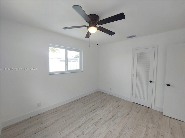 4579 NW 16th Way, Tamarac, FL 33309 - empty room with light wood-type flooring, ceiling fan, and baseboards
