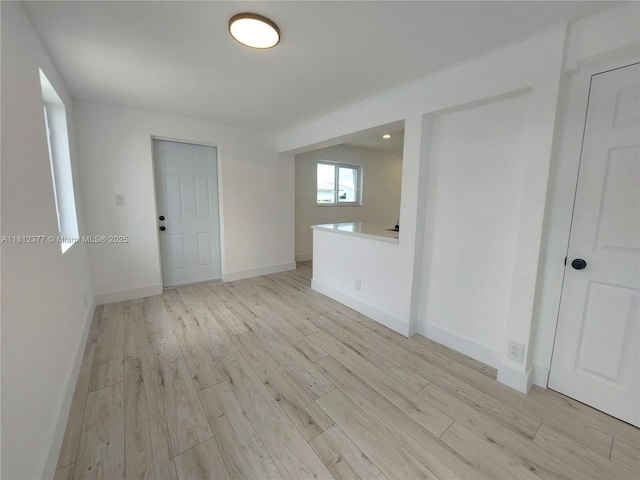 4579 NW 16th Way, Tamarac, FL 33309 - spare room with light wood-type flooring and baseboards