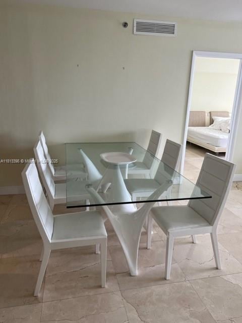 1830 S Ocean Dr Unit 2103, Hallandale Beach, FL 33009 - unfurnished dining area featuring baseboards