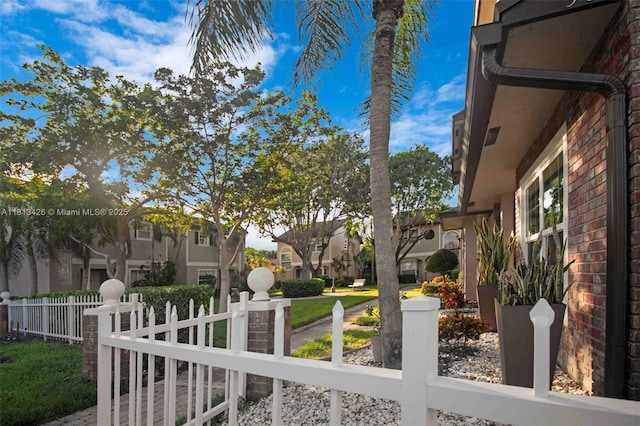 3897 NW 122nd Ter, Sunrise, FL 33323 - fenced front yard featuring a residential view