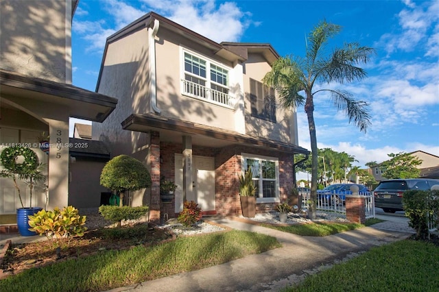 3897 NW 122nd Ter, Sunrise, FL 33323 - view of front of home featuring stucco siding and brick siding