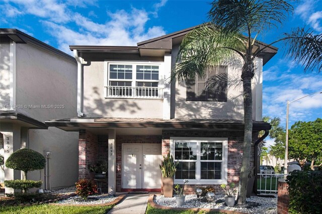 3897 NW 122nd Ter, Sunrise, FL 33323 - view of front of property with stucco siding and brick siding