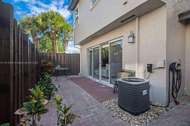3897 NW 122nd Ter, Sunrise, FL 33323 - view of patio featuring central air condition unit