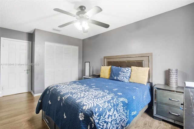2620 NW 79th Ave, Margate, FL 33063 - bedroom with a closet, wood finished floors, a ceiling fan, and baseboards