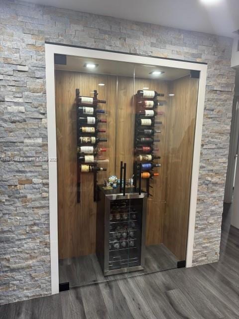 4550 NW 9th St Unit 520E, Miami, FL 33126 - wine room with wood finished floors and electric panel