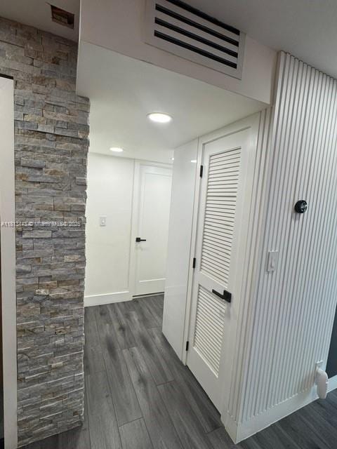 4550 NW 9th St Unit 520E, Miami, FL 33126 - hallway featuring dark wood finished floors and baseboards