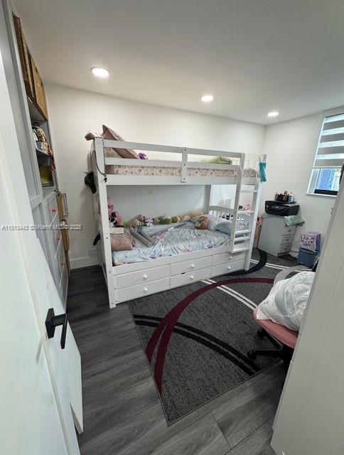 4550 NW 9th St Unit 520E, Miami, FL 33126 - bedroom with wood finished floors and recessed lighting