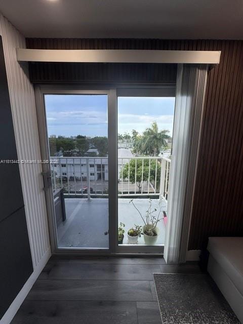 4550 NW 9th St Unit 520E, Miami, FL 33126 - doorway featuring healthy amount of natural light and wood finished floors