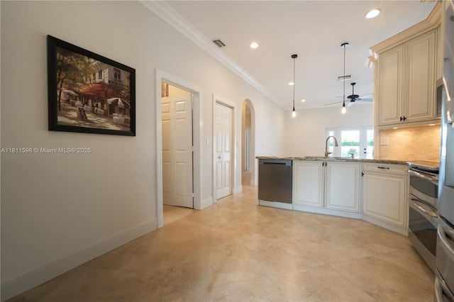 16404 Diamond Pl, Weston, FL 33331 - kitchen with stainless steel appliances, crown molding, a peninsula, arched walkways, and a ceiling fan