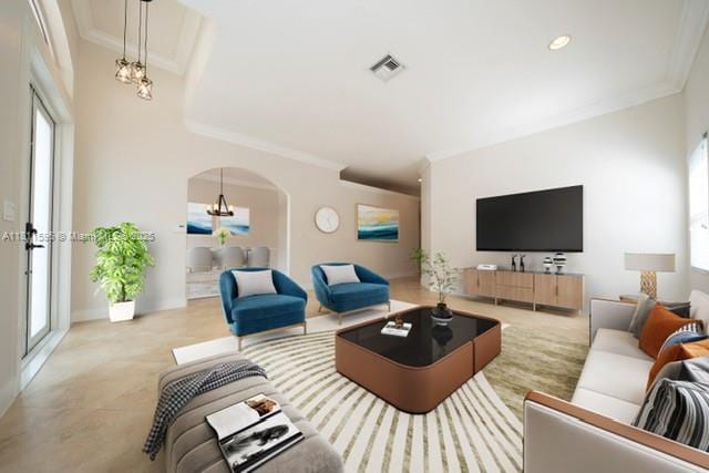 16404 Diamond Pl, Weston, FL 33331 - living area with arched walkways, crown molding, plenty of natural light, and recessed lighting