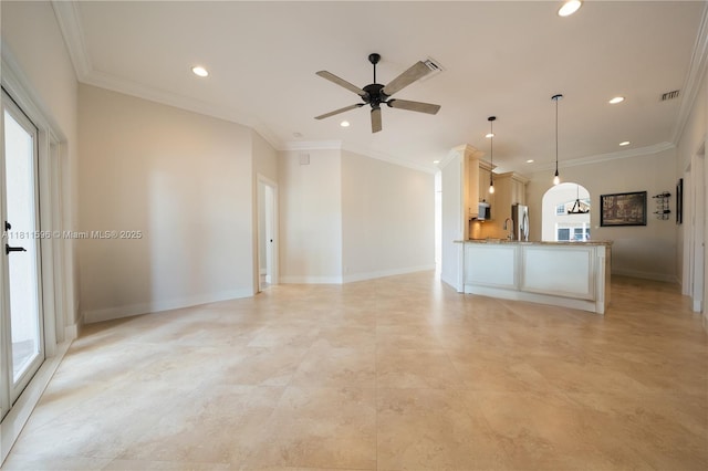 16404 Diamond Pl, Weston, FL 33331 - unfurnished living room with recessed lighting, ceiling fan, plenty of natural light, baseboards, and crown molding
