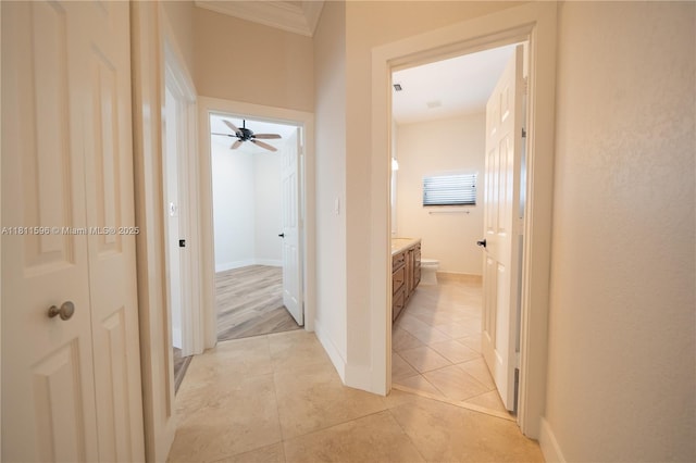 16404 Diamond Pl, Weston, FL 33331 - corridor featuring light tile patterned floors, crown molding, and baseboards