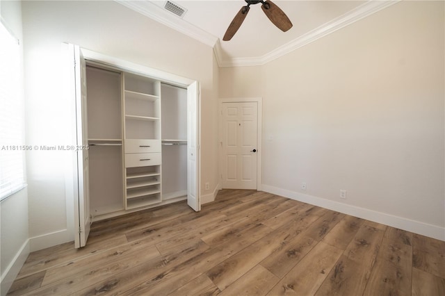 16404 Diamond Pl, Weston, FL 33331 - unfurnished bedroom featuring crown molding, baseboards, light wood finished floors, a closet, and ceiling fan