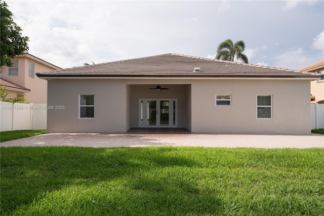 16404 Diamond Pl, Weston, FL 33331 - back of property featuring french doors, a ceiling fan, stucco siding, and a patio