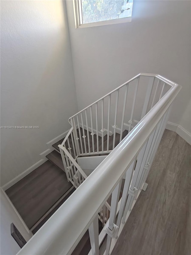 17847 NW 74th Path, Hialeah, FL 33015 - stairway featuring wood finished floors and baseboards