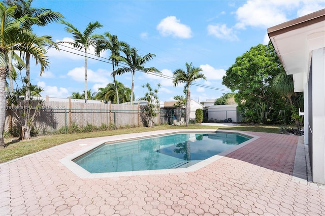 4331 NW 9th Ct, Coconut Creek, FL 33066 - view of pool featuring a patio area and a fenced backyard