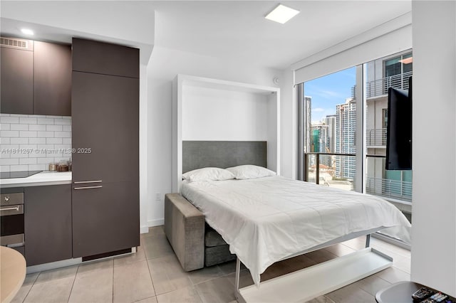 227 NE 2nd St Unit 2208, Miami, FL 33132 - bedroom featuring light tile patterned floors