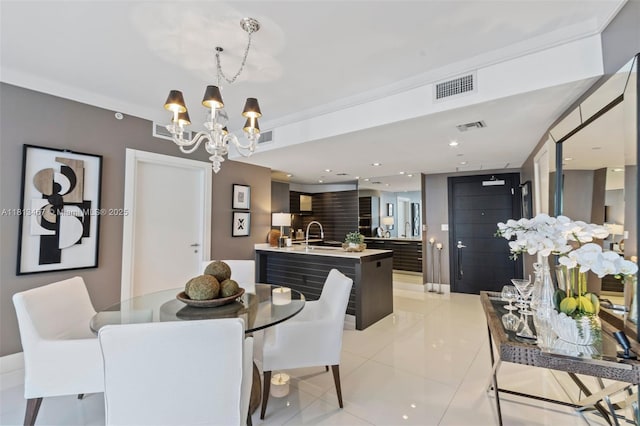200 Biscayne Boulevard Way Unit 3904, Miami, FL 33131 - dining room with a chandelier and light tile patterned floors