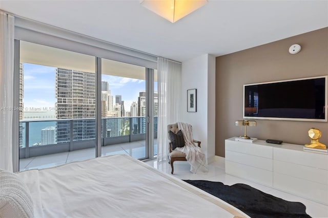 200 Biscayne Boulevard Way Unit 3904, Miami, FL 33131 - tiled bedroom featuring access to outside, multiple windows, and baseboards