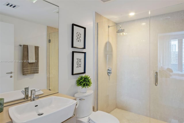 200 Biscayne Boulevard Way Unit 3904, Miami, FL 33131 - bathroom featuring a stall shower, toilet, and vanity