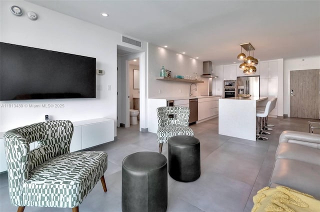 4001 S Ocean Dr Unit 14H, Hollywood, FL 33019 - living room with recessed lighting and concrete flooring