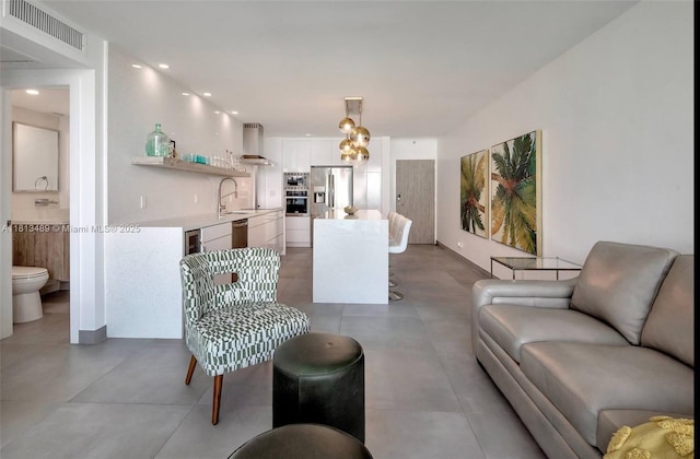 4001 S Ocean Dr Unit 14H, Hollywood, FL 33019 - living room with recessed lighting and baseboards