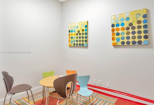 4001 S Ocean Dr Unit 14H, Hollywood, FL 33019 - playroom with baseboards