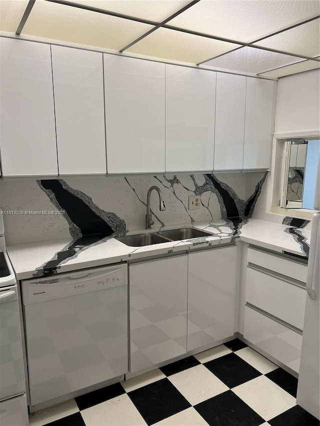 3475 S Ocean Blvd Unit 1130, Palm Beach, FL 33480 - kitchen with dishwasher, modern cabinets, white cabinetry, and tile patterned floors