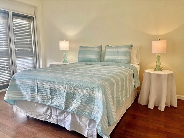 3475 S Ocean Blvd Unit 1130, Palm Beach, FL 33480 - bedroom featuring wood finished floors and baseboards