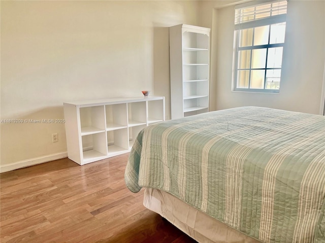 3475 S Ocean Blvd Unit 1130, Palm Beach, FL 33480 - bedroom with wood finished floors and baseboards