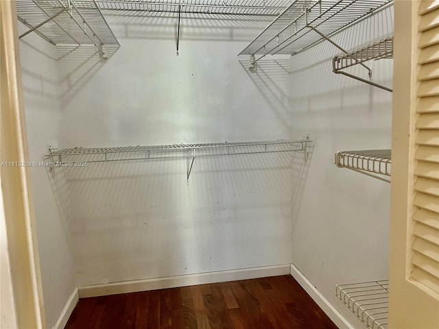3475 S Ocean Blvd Unit 1130, Palm Beach, FL 33480 - spacious closet featuring wood finished floors