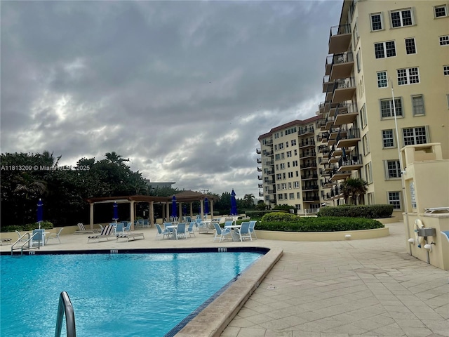 3475 S Ocean Blvd Unit 1130, Palm Beach, FL 33480 - community pool with a pergola and a patio
