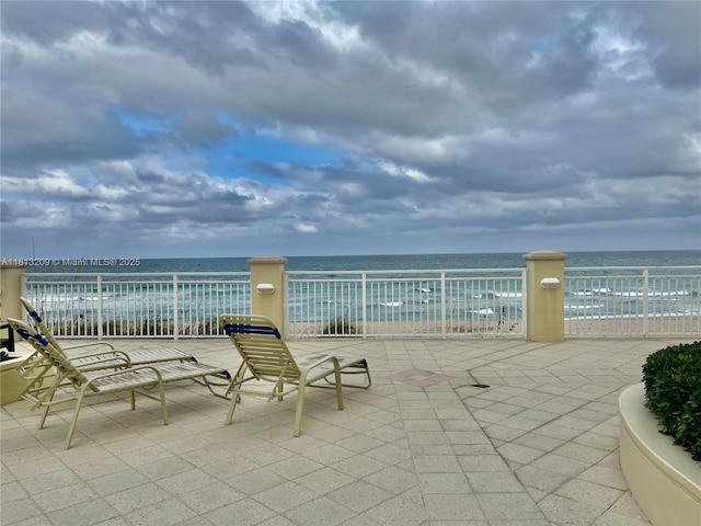 3475 S Ocean Blvd Unit 1130, Palm Beach, FL 33480 - view of patio featuring a water view