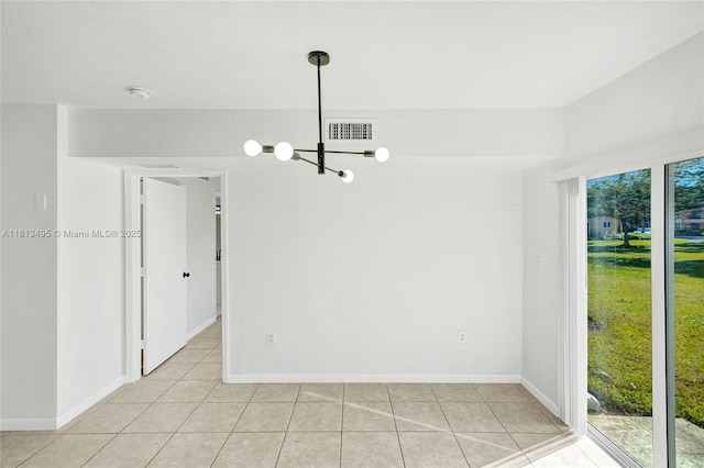 3398 NE 9th Dr Unit 104, Homestead, FL 33033 - unfurnished room featuring a chandelier, light tile patterned floors, a smoke detector, and baseboards