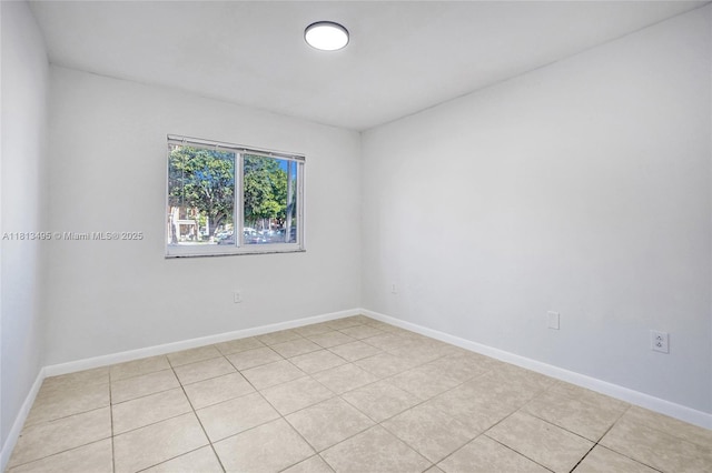 3398 NE 9th Dr Unit 104, Homestead, FL 33033 - unfurnished room featuring baseboards and light tile patterned floors