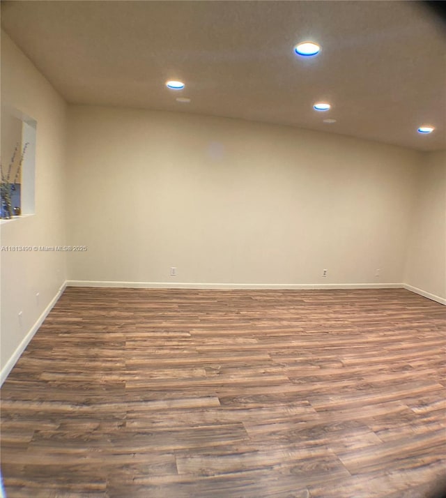 2061 NW 47th Ter Unit 205, Lauderhill, FL 33313 - unfurnished room featuring wood finished floors, baseboards, and recessed lighting