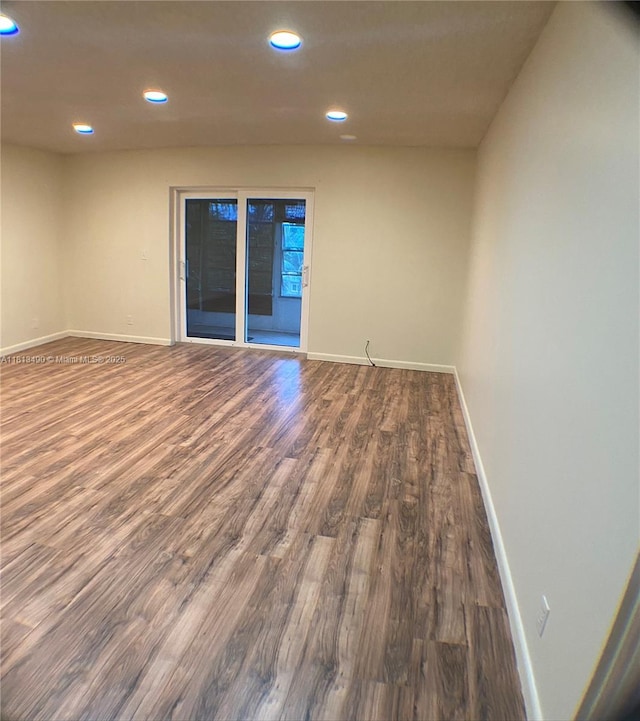 2061 NW 47th Ter Unit 205, Lauderhill, FL 33313 - spare room with baseboards, wood finished floors, and recessed lighting