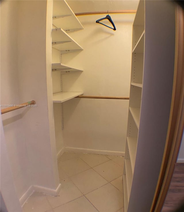 2061 NW 47th Ter Unit 205, Lauderhill, FL 33313 - spacious closet with tile patterned floors
