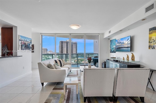 19400 Turnberry Way Unit 1131, Aventura, FL 33180 - living area with a wall of windows, baseboards, and light tile patterned flooring