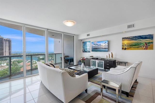 19400 Turnberry Way Unit 1131, Aventura, FL 33180 - living area with a wall of windows and light tile patterned floors