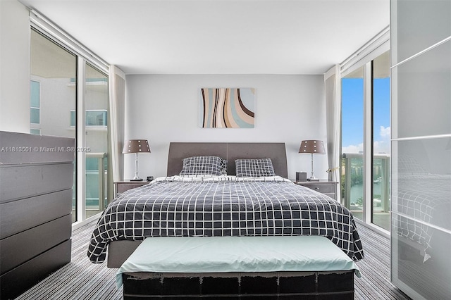 19400 Turnberry Way Unit 1131, Aventura, FL 33180 - bedroom with a wall of windows and multiple windows