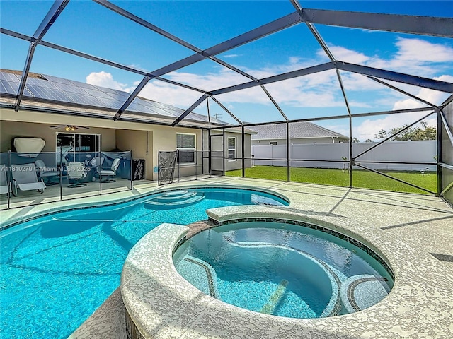 6142 NW Hopkins Ave, Port St Lucie, FL 34986 - view of pool featuring a patio area, a pool with connected hot tub, a ceiling fan, and a lanai