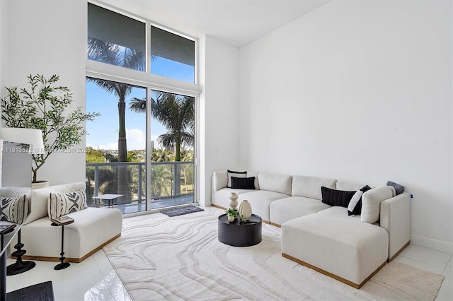 1900 N Bayshore Dr Unit 603, Miami, FL 33132 - living area with tile patterned floors and a high ceiling