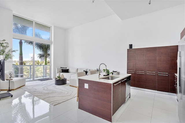 1900 N Bayshore Dr Unit 603, Miami, FL 33132 - kitchen featuring modern cabinets, expansive windows, plenty of natural light, and light tile patterned flooring