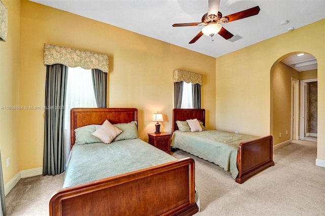 3308 Islewood Ave, Weston, FL 33332 - bedroom with arched walkways, light carpet, baseboards, and a ceiling fan