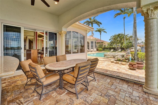 3308 Islewood Ave, Weston, FL 33332 - view of patio featuring a ceiling fan, outdoor dining area, and an outdoor pool