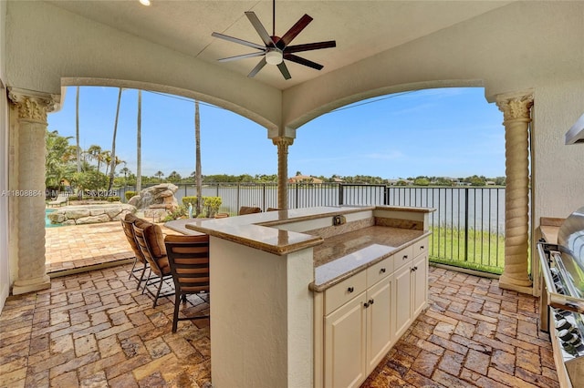3308 Islewood Ave, Weston, FL 33332 - view of patio with a water view, ceiling fan, and exterior kitchen