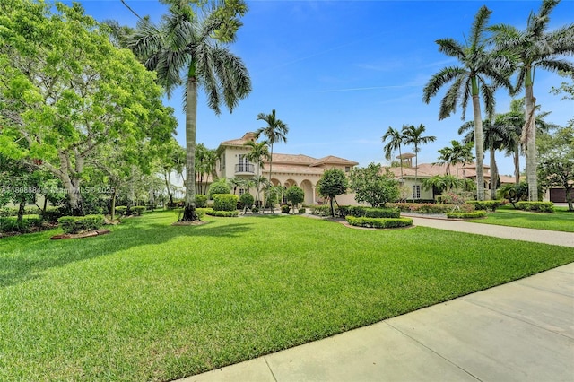 3308 Islewood Ave, Weston, FL 33332 - view of front of house with stucco siding and a front yard